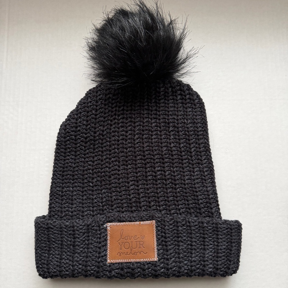 Love Your Melon Cuffed Knit Beanie Hat Smoke Black Pom Leather Patch
